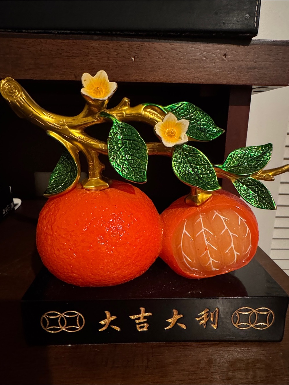 Orange Fruit with Gold Branches and Green Leaves